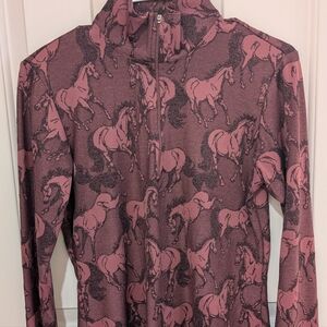 Women's zip up riding shirt.